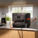 Jackery Explorer 1500 Ultra Portable Power Station on a kitchen counter with cables connected
