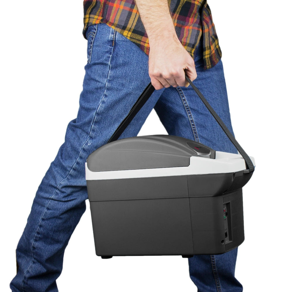 A Man Carrying Wagan 6 Quart Personal Fridge/Warmer
