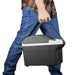 A Man Carrying Wagan 6 Quart Personal Fridge/Warmer