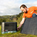 A Man Connecting Lithium Cube™ EX18 To A Solar Panel