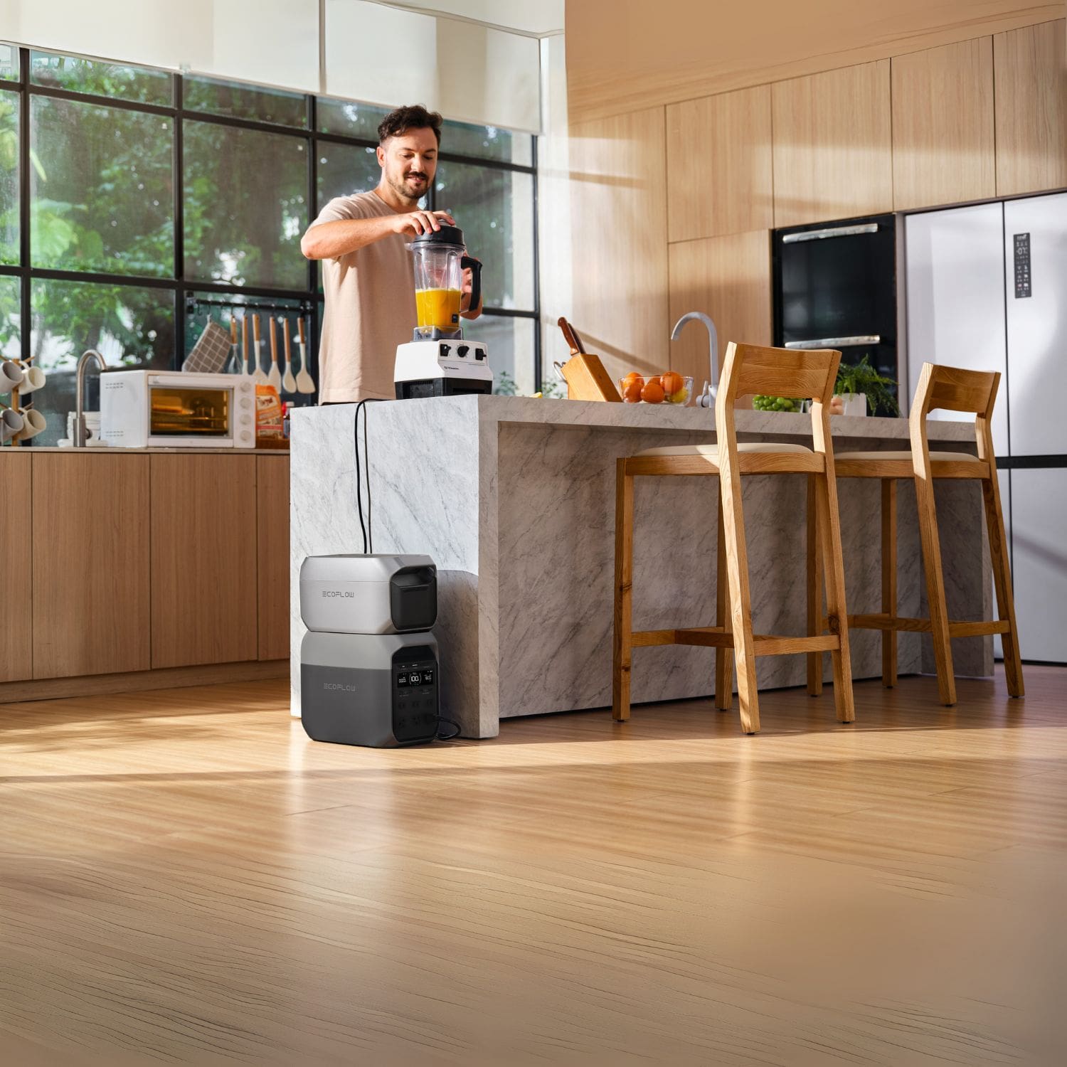 A man using a blender powered by the EcoFlow DELTA 3