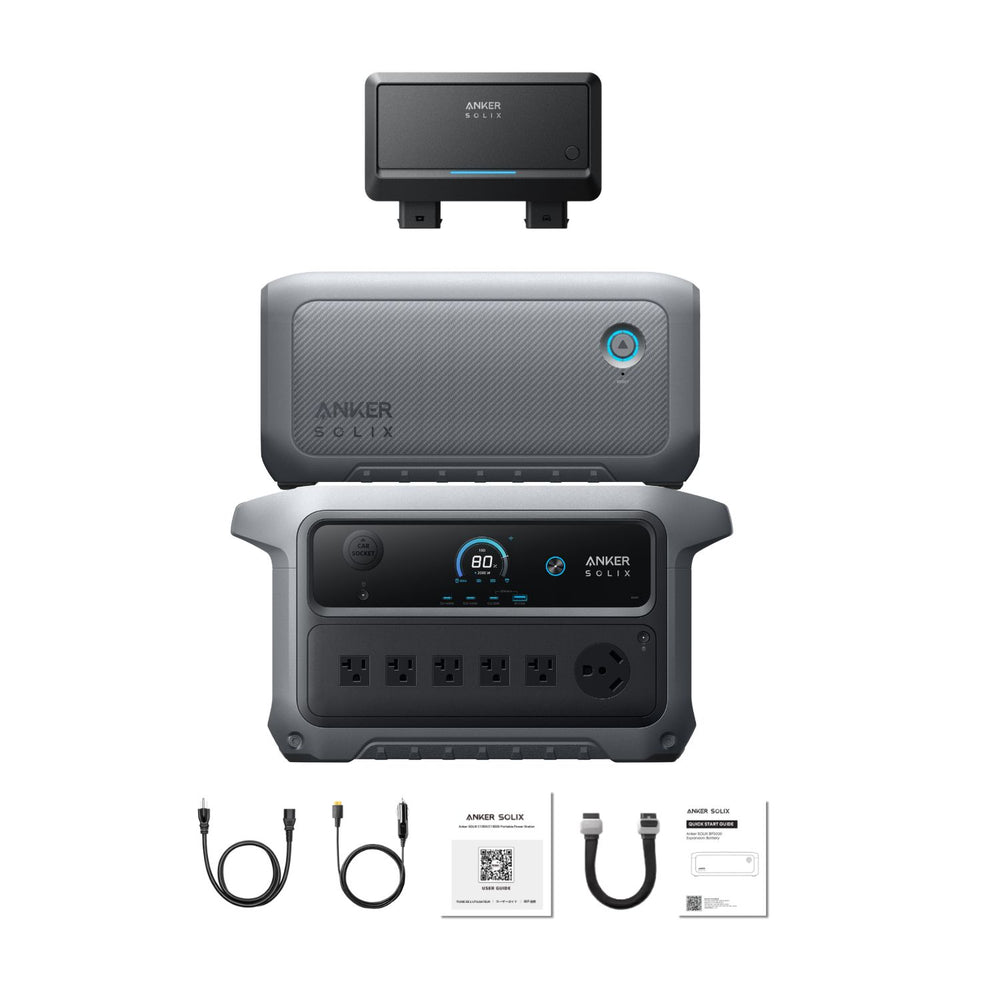 Anker SOLIX C2000 Gen 2 Portable Power Station with extra battery, car alternator and  cables and documentation on a white background 