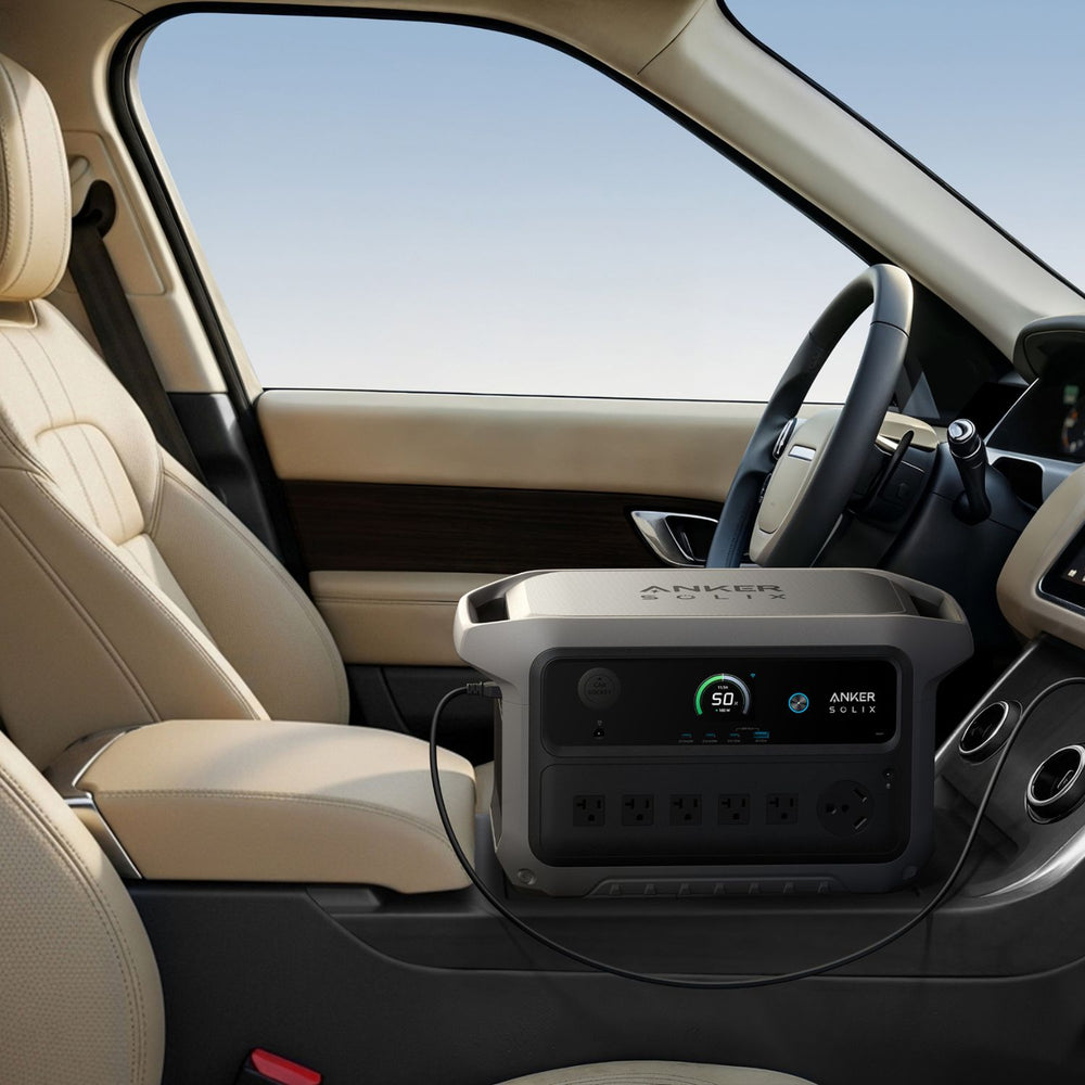 Anker SOLIX C2000 Gen 2 Portable Power Station inside a car with beige interior