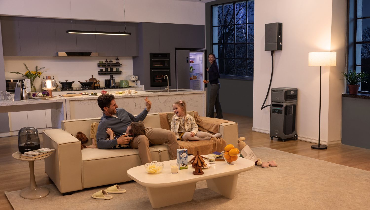 Anker SOLIX F3800 Plus Power Station in a living room with four people