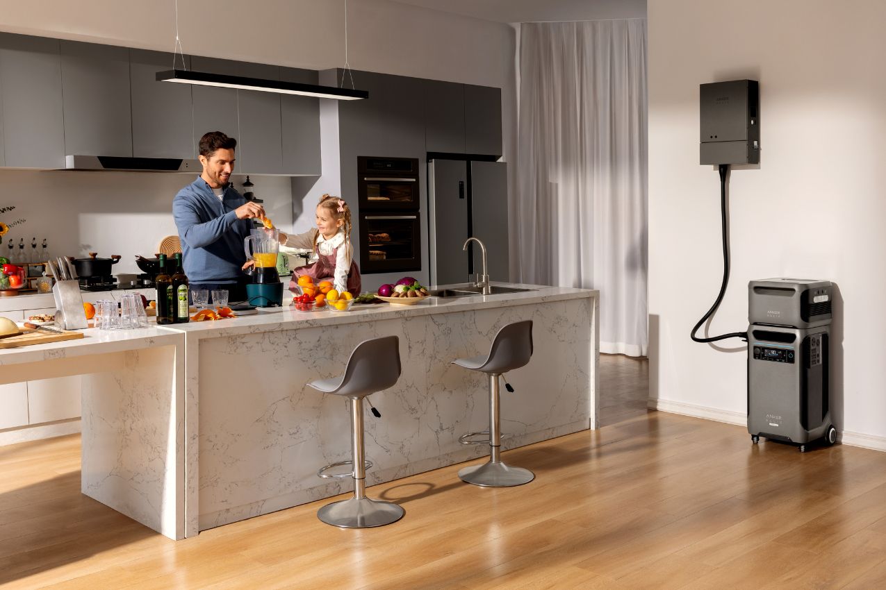 Anker SOLIX F3800 Plus Power Station in the kitchen with two people