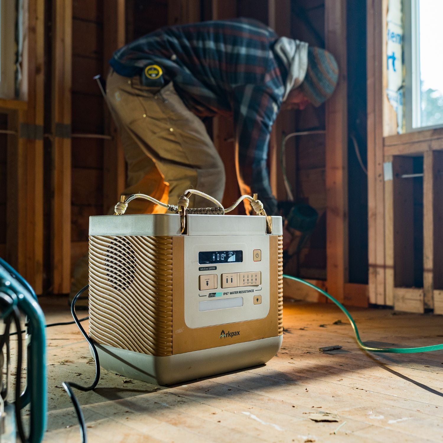 Arkpax Ark Evo Portable Power Station in use during a work task