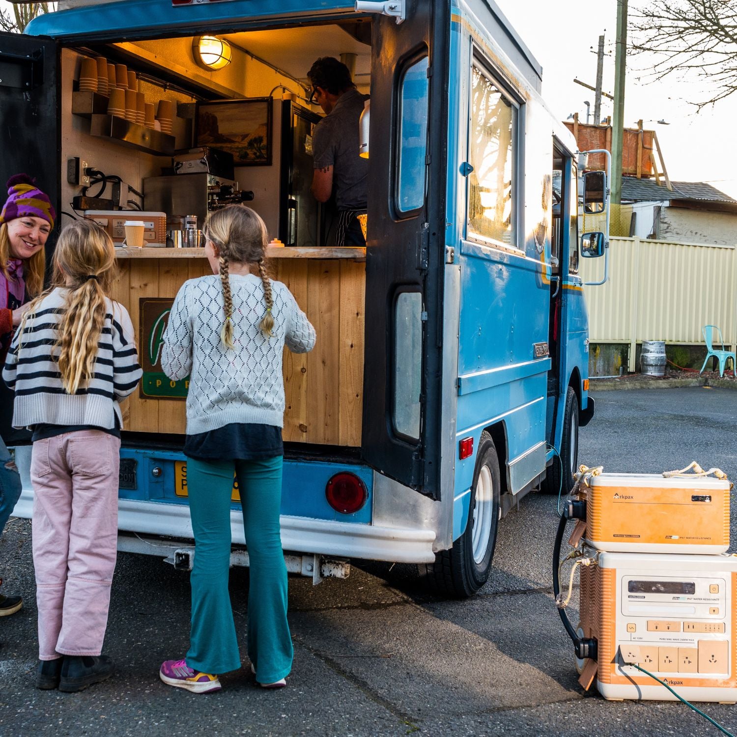 Arkpax Ark Pro portable power station powering equipment in a coffee truck