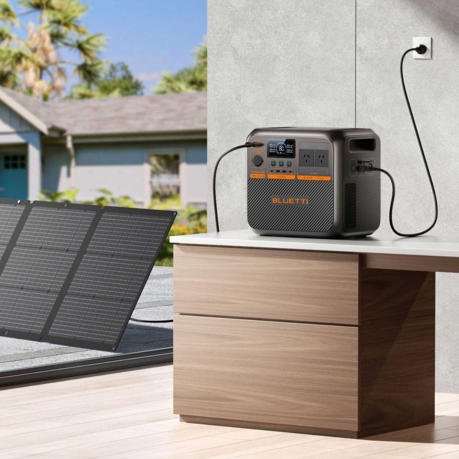 BLUETTI Premium 200 V2 Portable Power Station charging via connected solar panels outdoors
