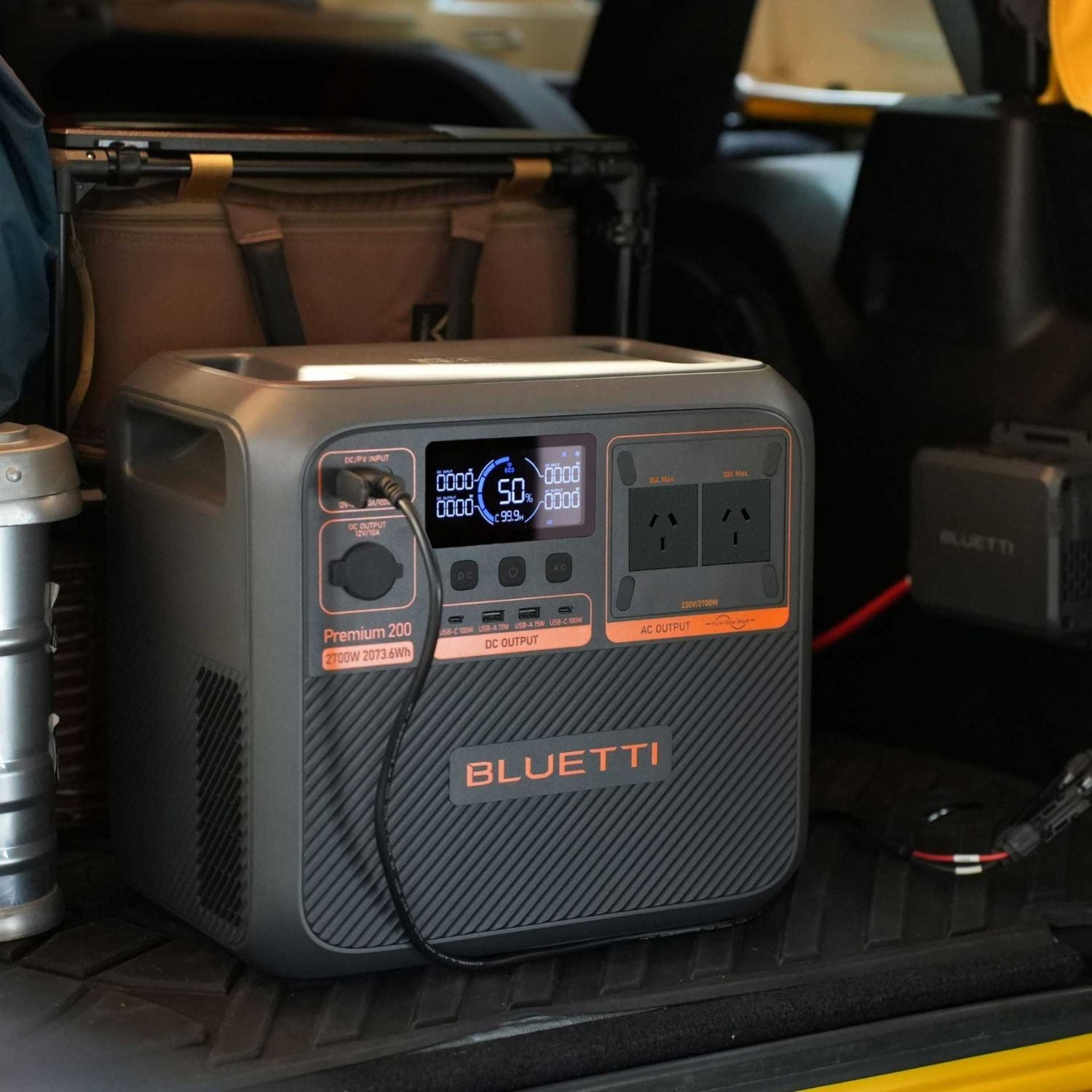 BLUETTI Premium 200 V2 Portable Power Station placed in the trunk of a car
