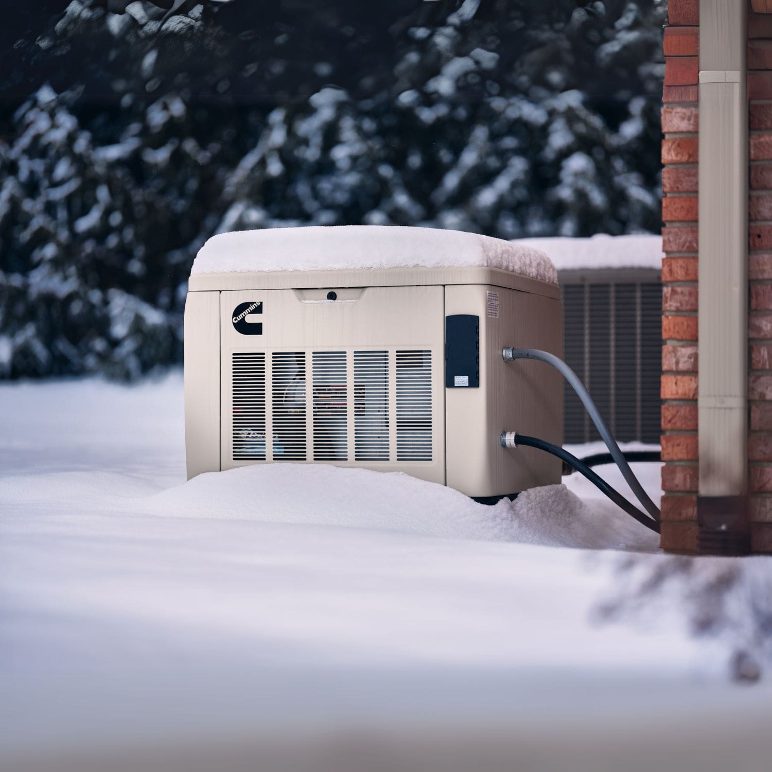 Cummins RS17A 17kW Home Standby Generator installed outside in the snow