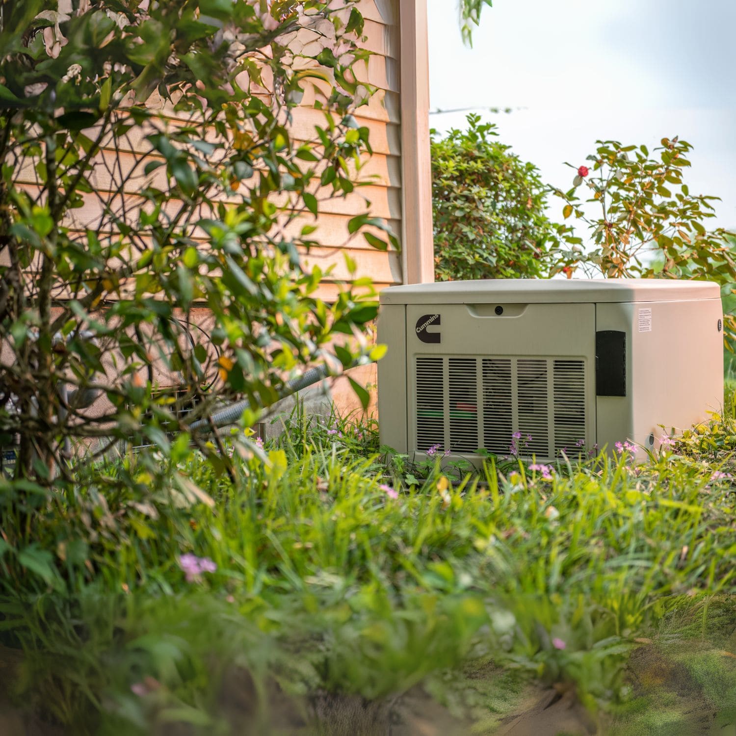Cummins RS20A 20kW Home Standby Generator installed in the backyard 