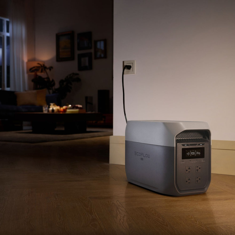DELTA 3 Max Portable Power Station Black silver on a wooden floor with a blurred living room background