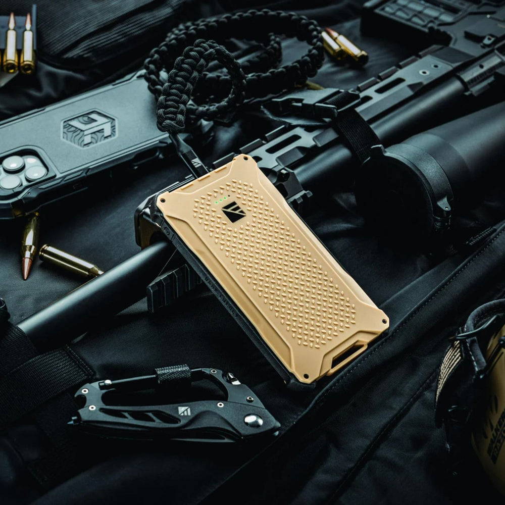 Dark Energy Poseidon Pro Power Bank - Desert with a phone charging to it 