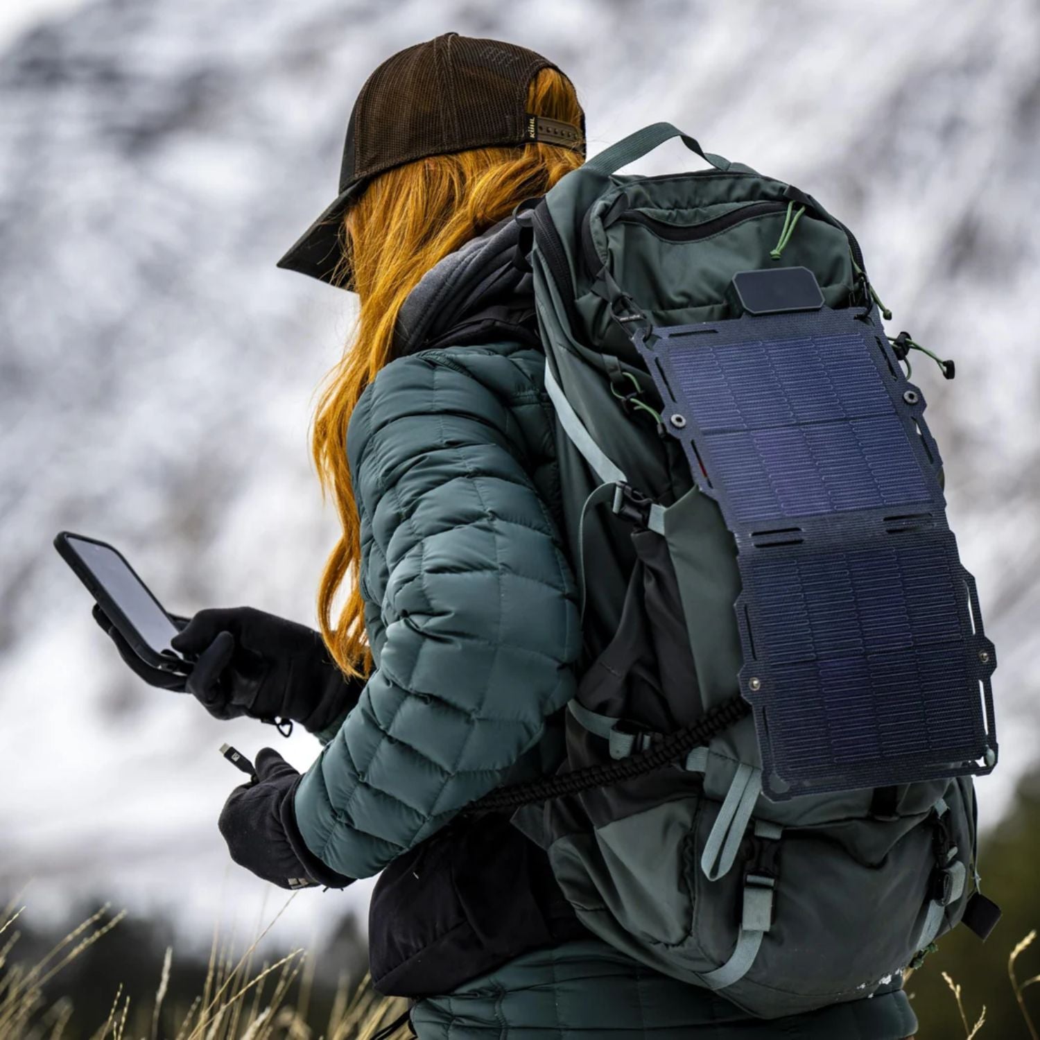 Dark Energy Spectre 8W Solar Panel - Gray at the back of a woman