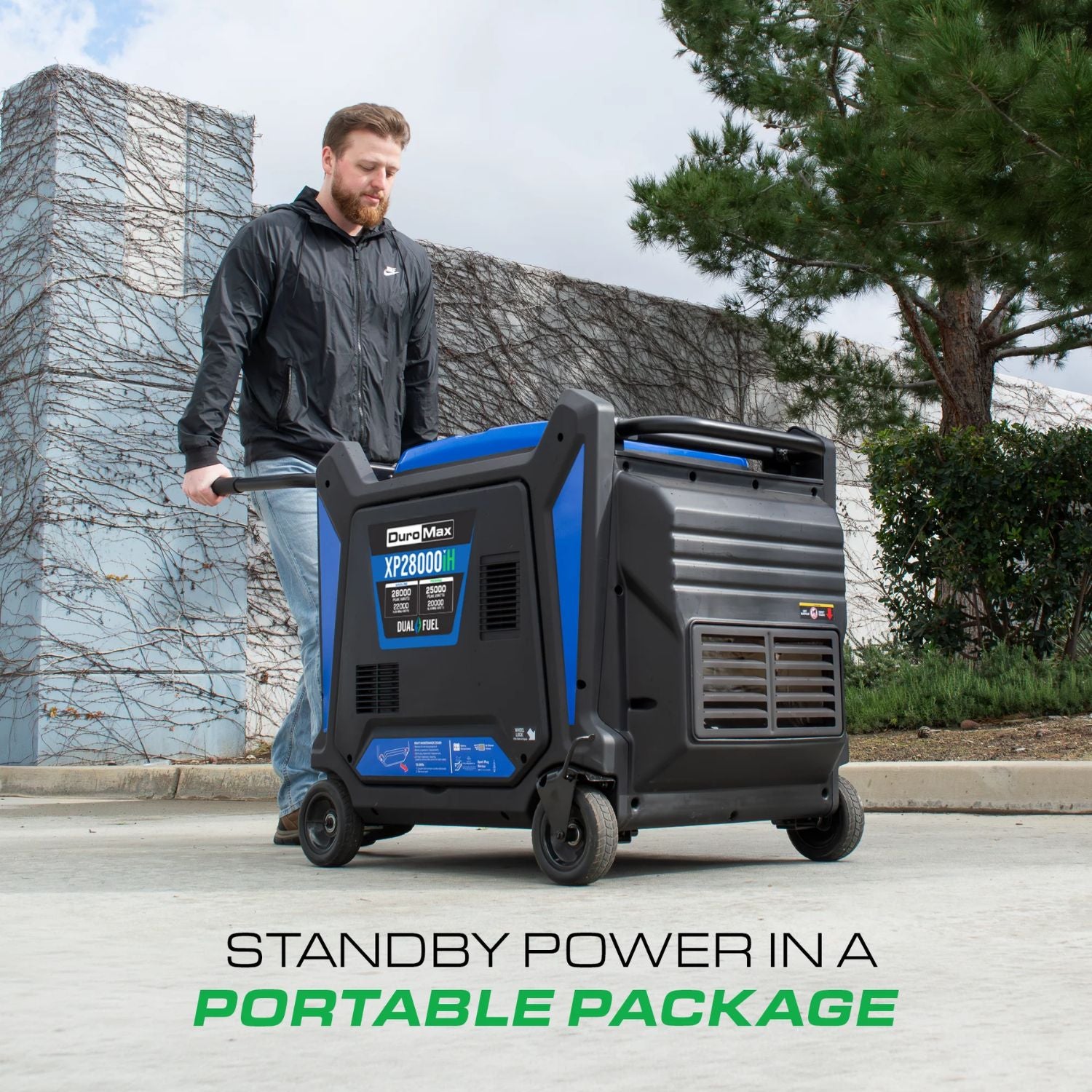 DuroMax XP28000iH Dual Fuel 28000W/22000W Portable Inverter Generator man pushing it with trolley 