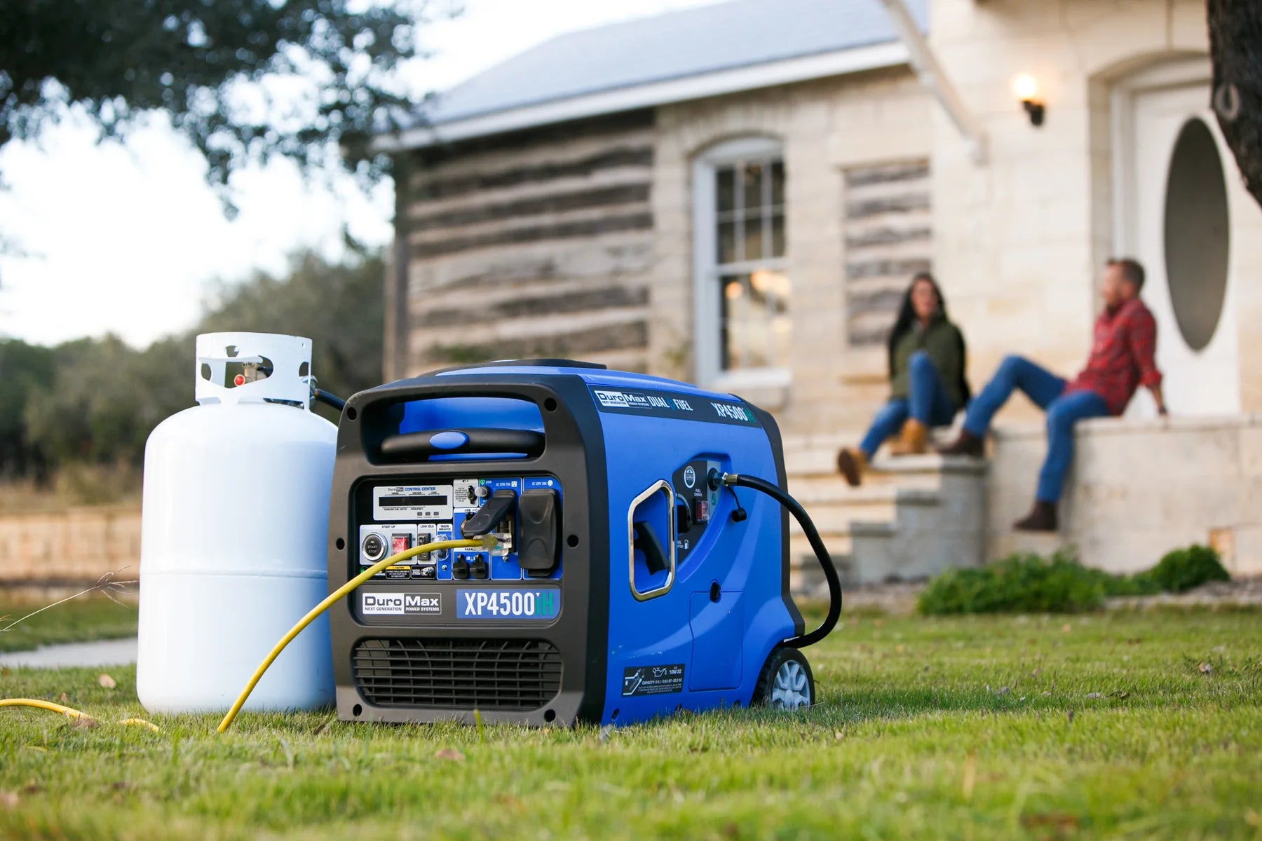DuroMax XP4500iH Generator Outdoors With A Propane Tank