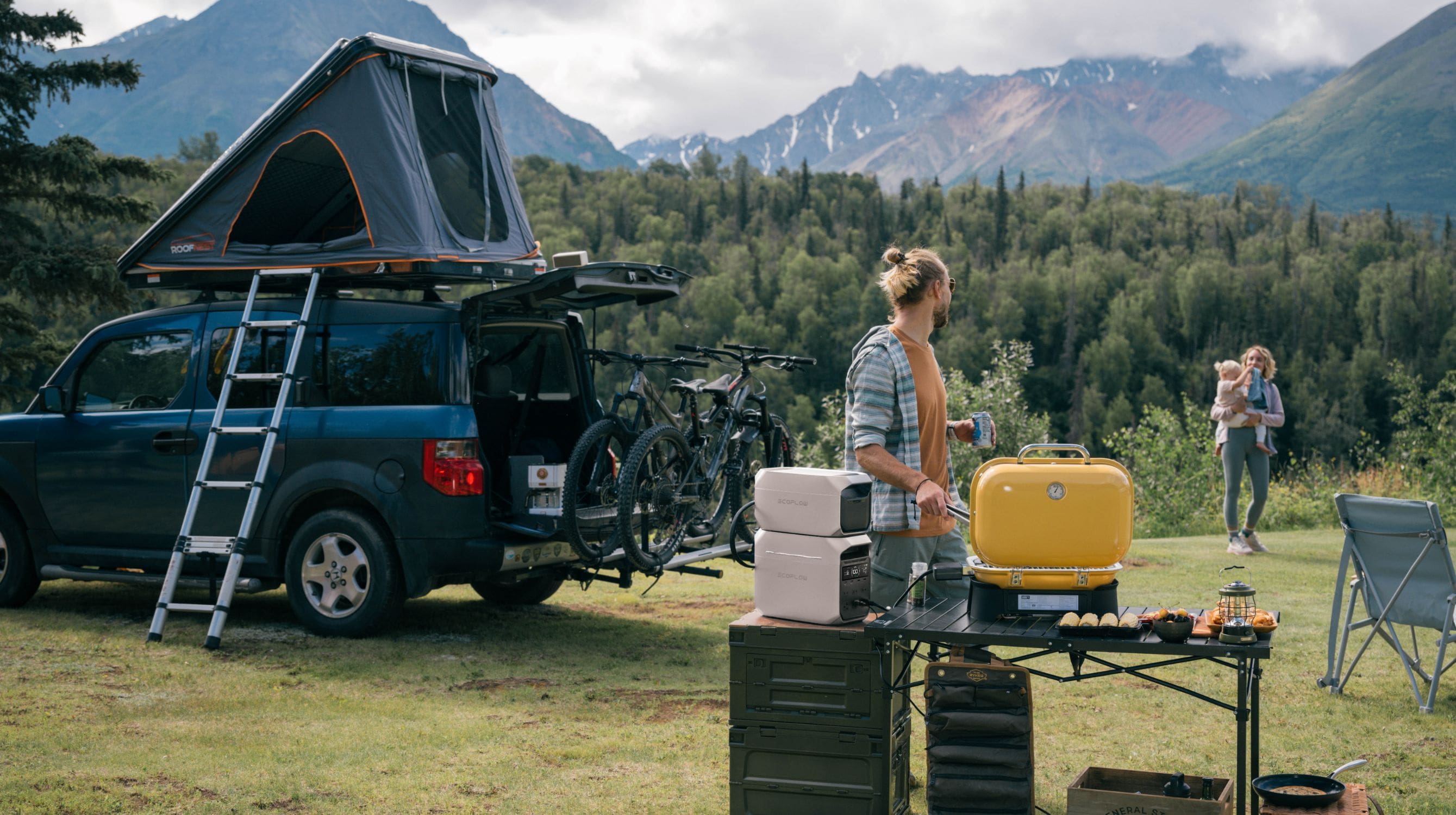 EcoFlow DELTA 3 Plus Portable Power Station beside a man using electric BBQ Grill
