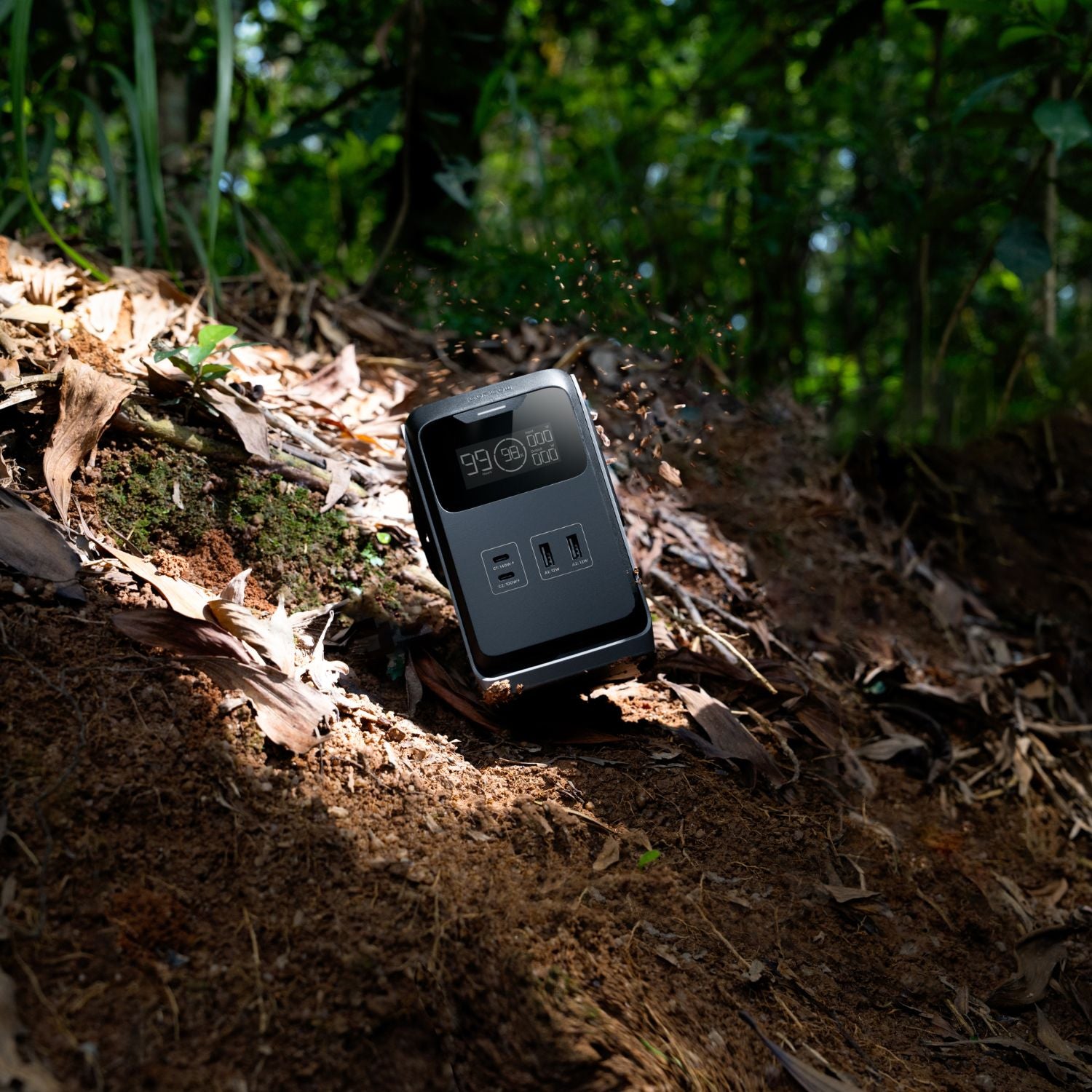 EcoFlow TRAIL 200DC Portable Power Station on a forest floor