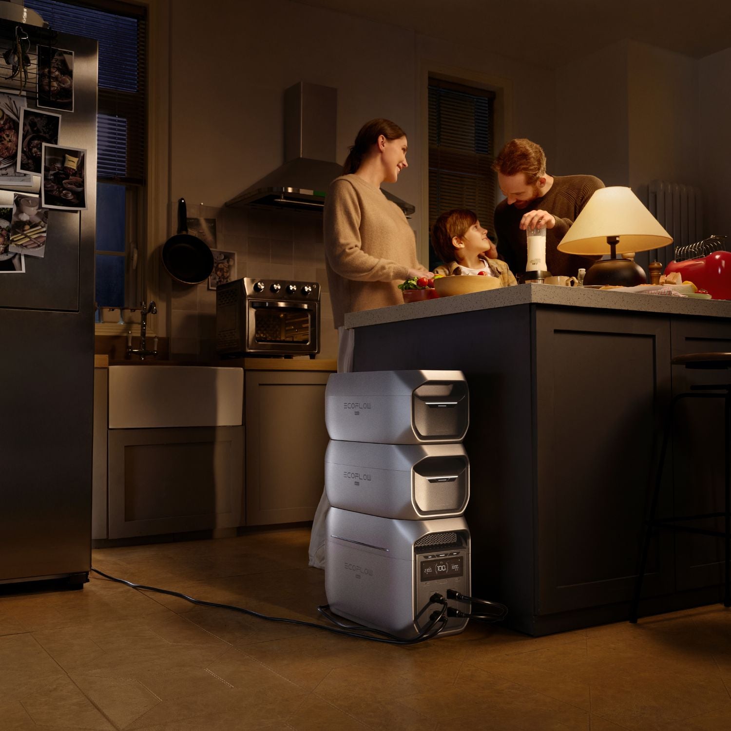 Family in a kitchen with EcoFlow DELTA 3 Max Plus Portable Power Station on the floor.