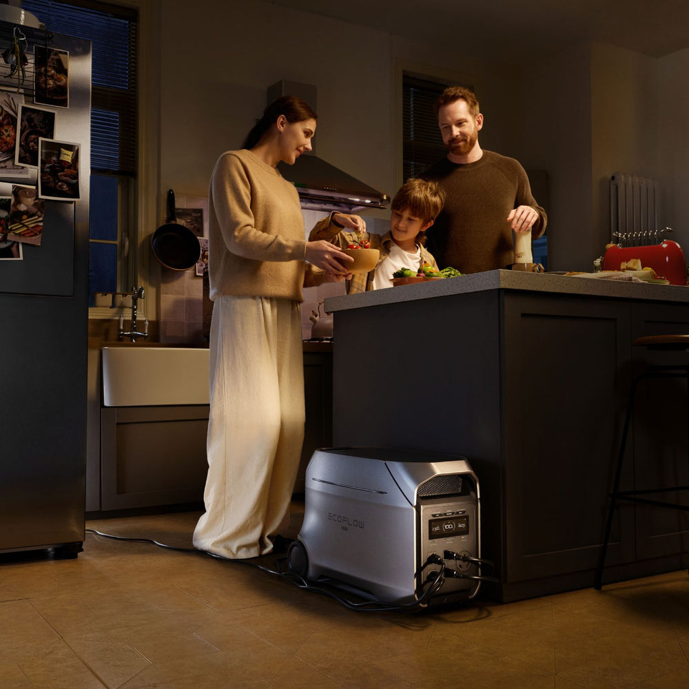 Family of three in a kitchen with a EcoFlow DELTA 3 Ultra Plus Portable Power Station on the floor.