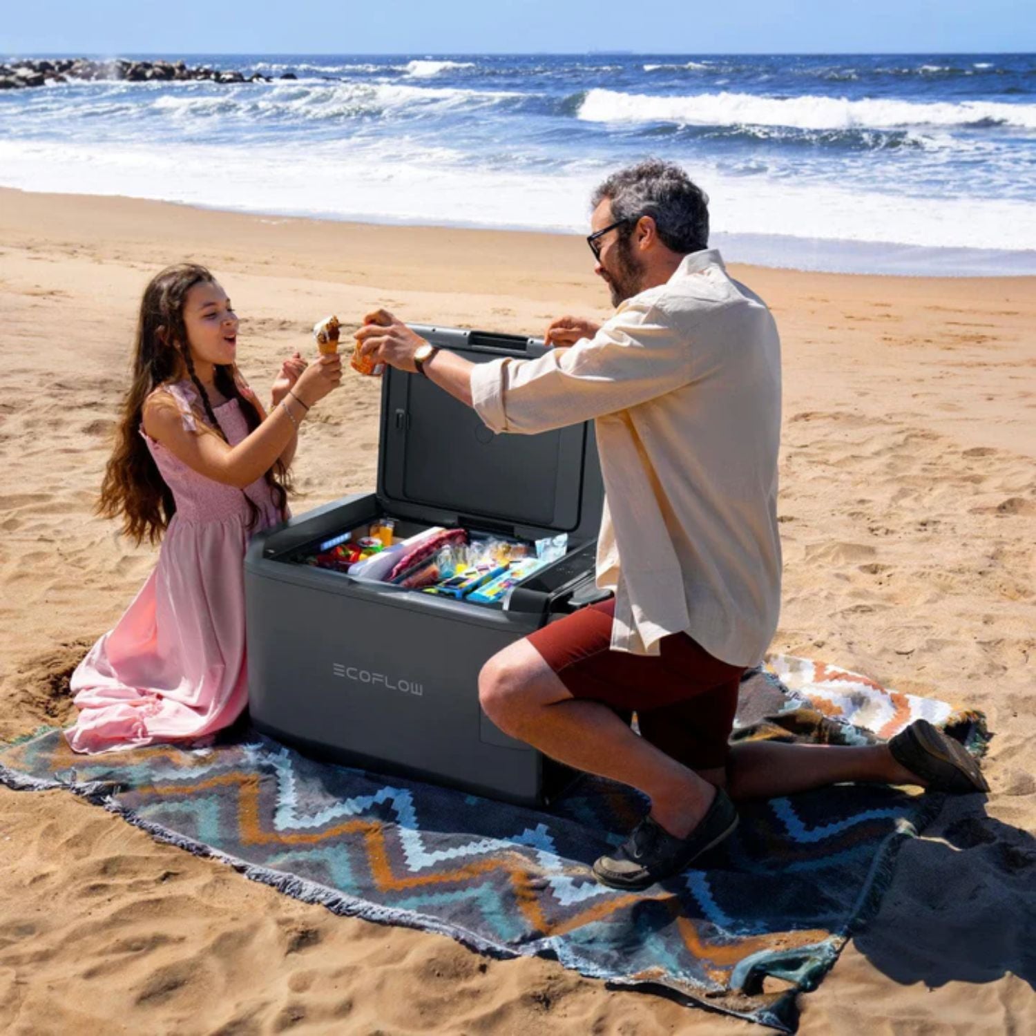 Father and daughter using the EcoFlow GLACIER Classic Portable Fridge Freezer