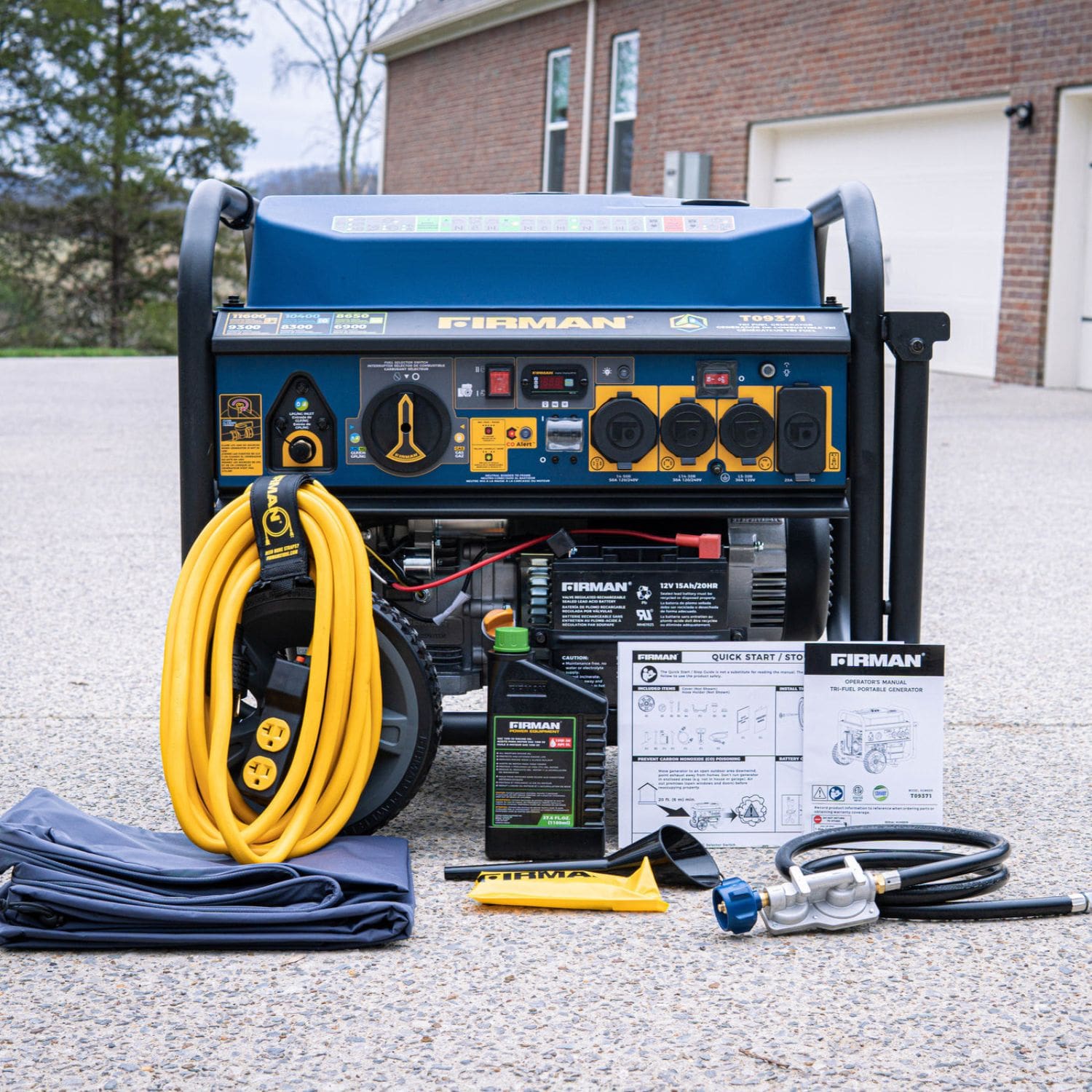 Firman T09371 Tri Fuel Portable Generator 11600W with package contents displayed in front
