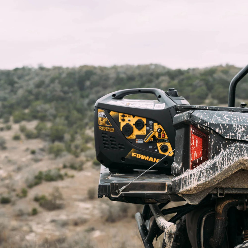Firman W01784 Generator attached to a vehicle with a scenic background