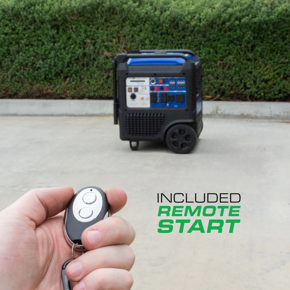 Hand holding a remote control with a DuroMax XP11000iHT Portable Inverter Generator  in the background, emphasizing remote start feature.