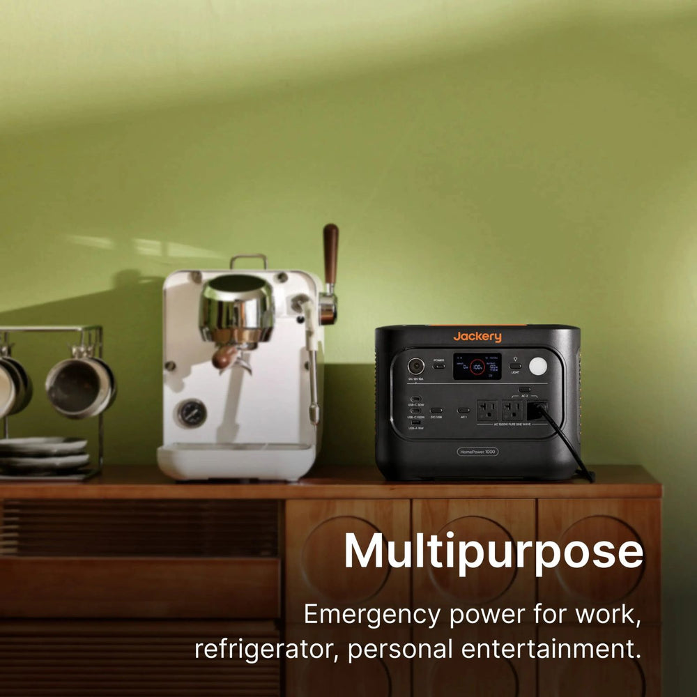 Jackery HomePower 1000 v2 Portable Power Station Orange and Black beside a coffee machine
