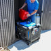 Man filling gasoline to DuroMax XP13500iHT Tri-Fuel 10,500W/13,500W Portable Inverter Generator 