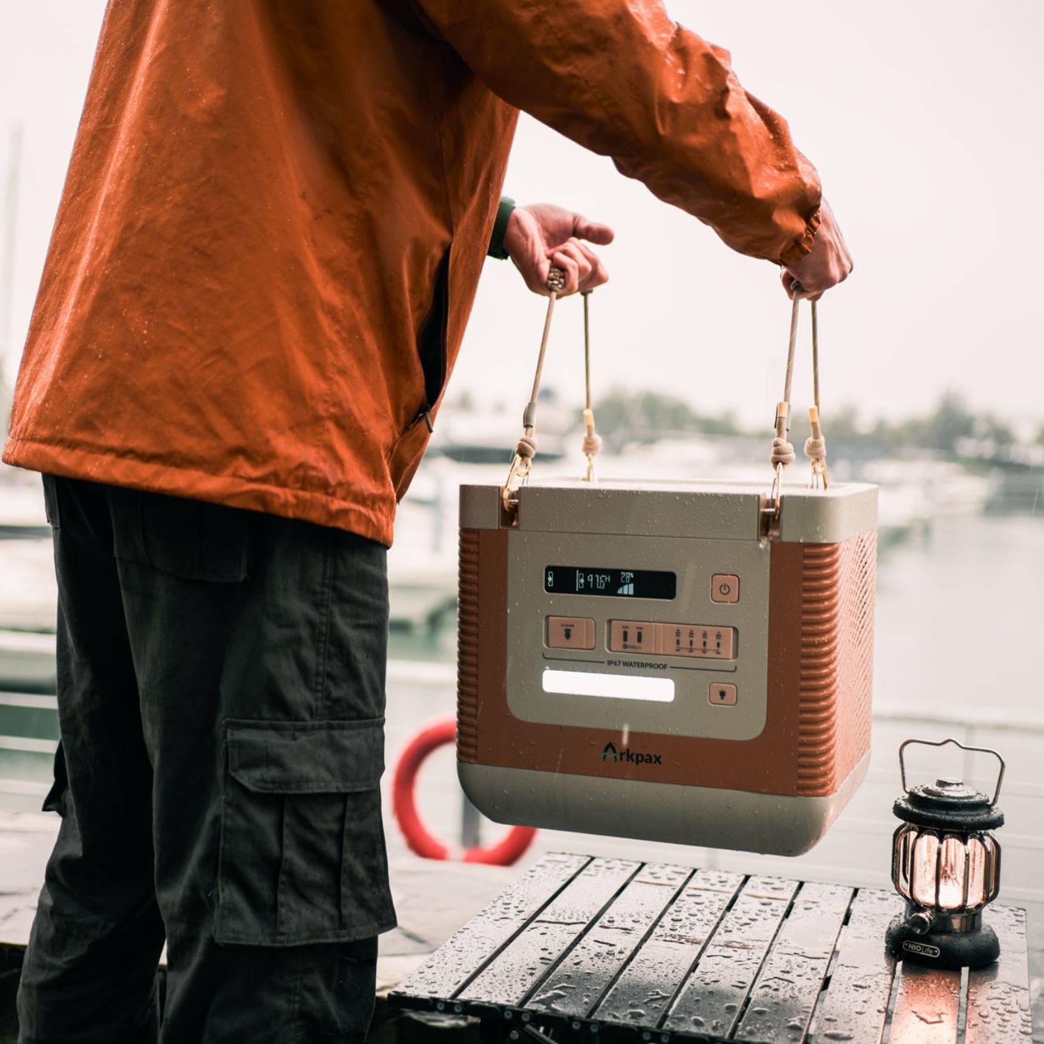 Man holding the Arkpax Ark Portable Power Station