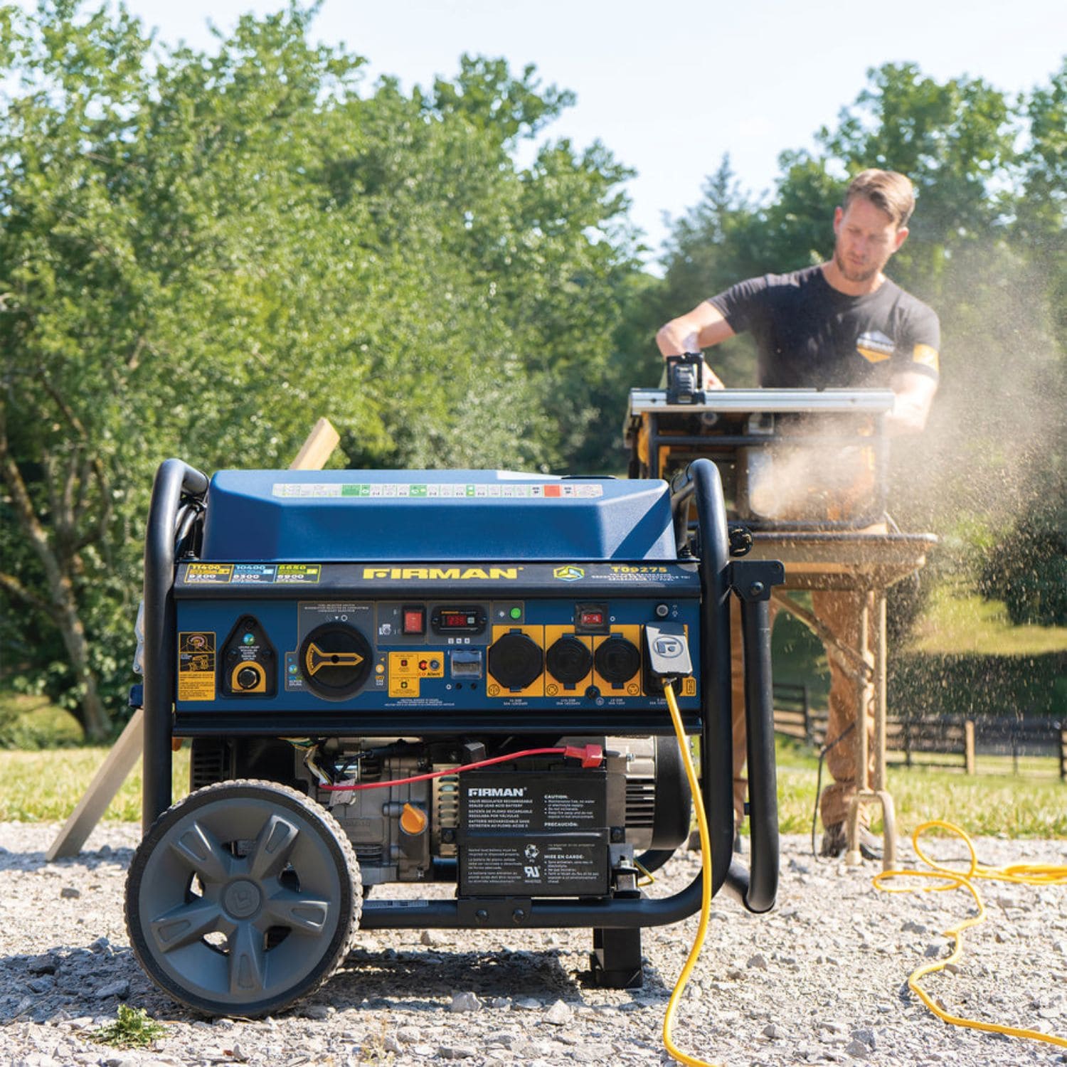 Man using Firman T09275 Tri Fuel Portable Generator 11,400W while cutting wood