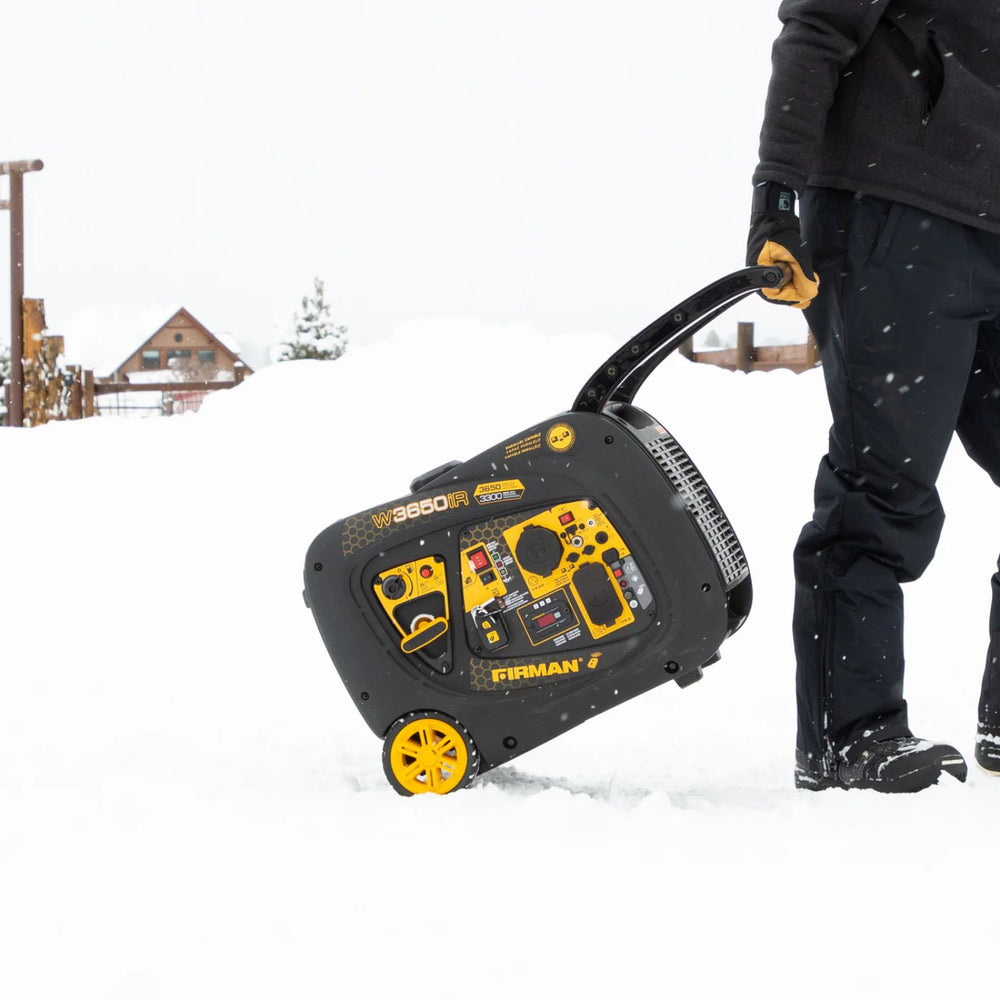 Person pushing a Firman W03383 Generator through snow