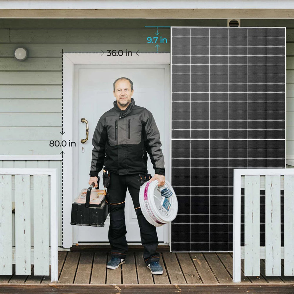 Person standing in front of a house with Renogy Bifacial 590W N-Type Monocrystalline Solar Panel on the wall