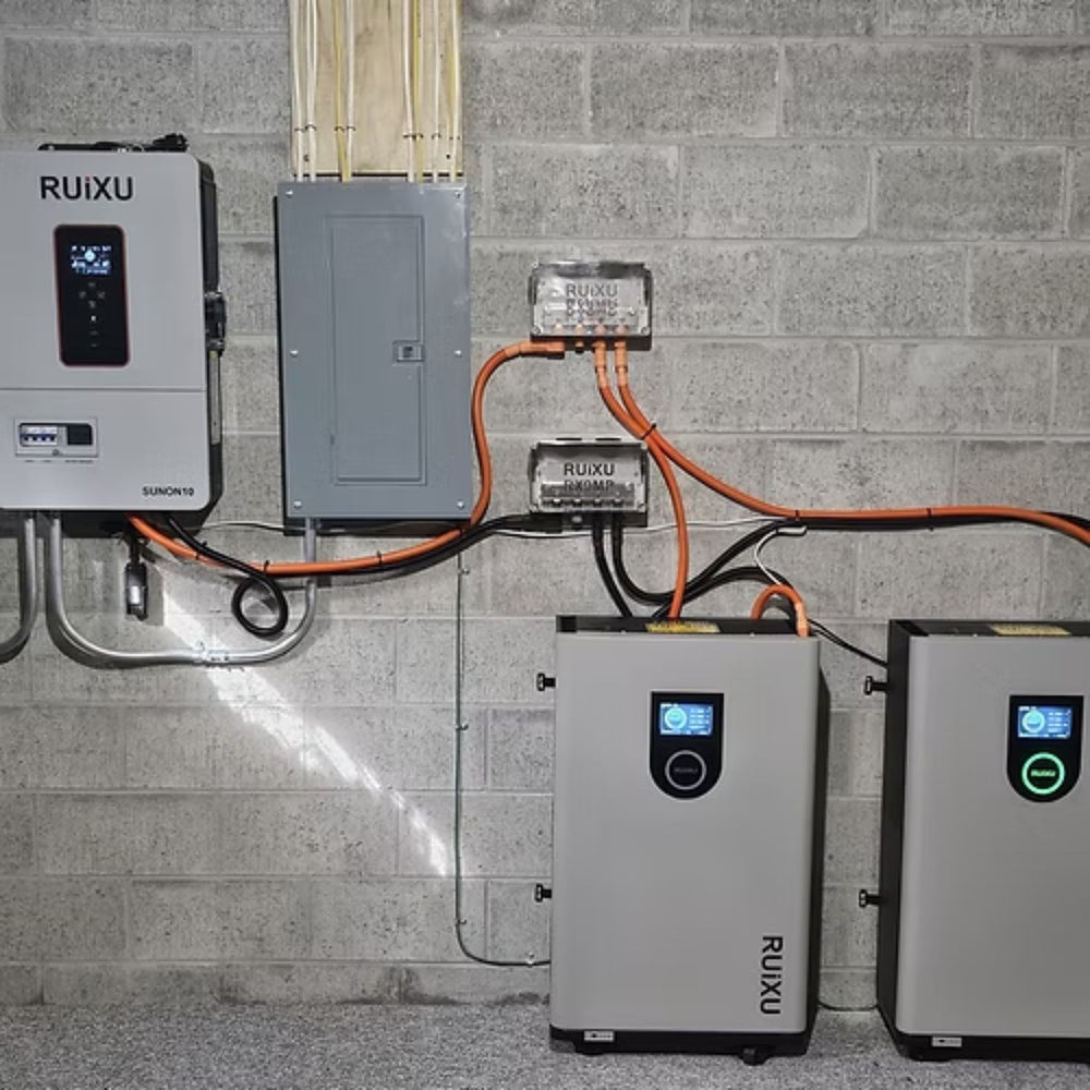 RUiXU SUNON10 10kW Off-Grid Inverter and related equipment mounted on a concrete wall.