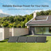 Renogy Solar Suitcase Kit 400W Lightweight Portable RV Kit on grass in front of a house with scenic background