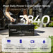 Renogy lithium iron phosphate battery with power consumption details on a blurred outdoor background