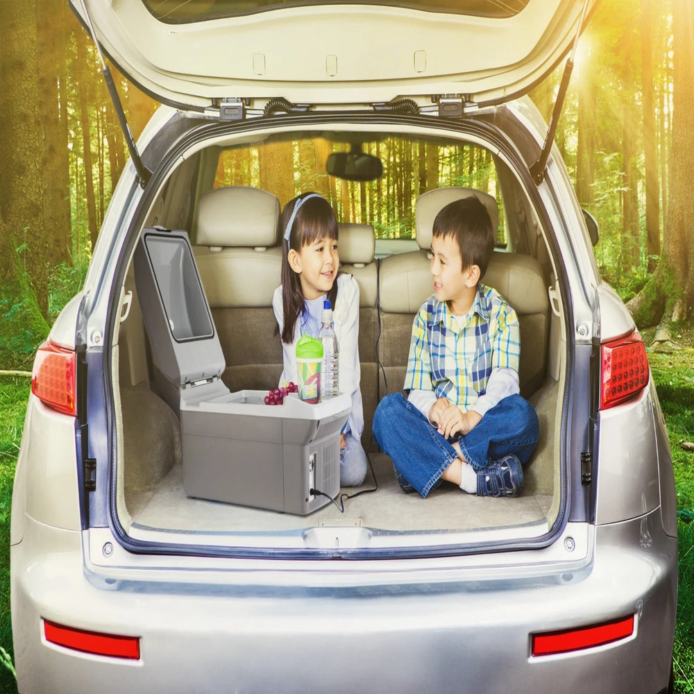 Two Children With Wagan Tech 14 Liter Personal Fridge Or Warmer In A Car Trunk