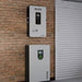 Two RUiXU SUNON10 10kW Off-Grid Inverter mounted on a brick wall.