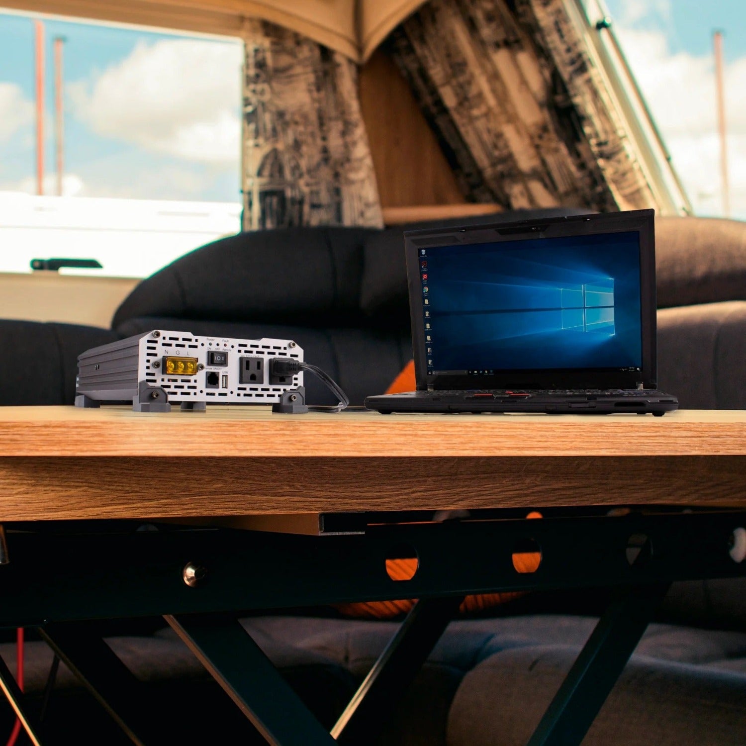 Wagan Pure Line Inverter 1000 Watt And A Laptop On The Table