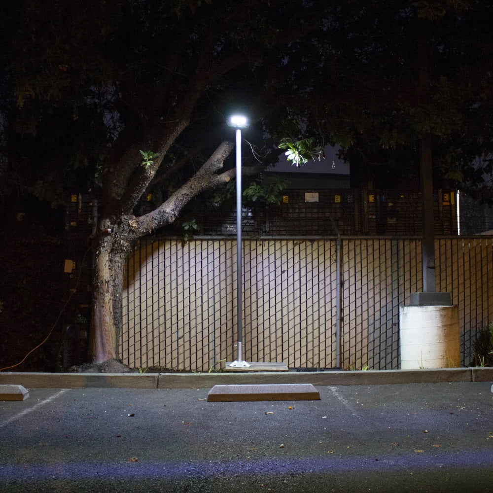 Wagan Tech Solar + LED Floodlight 1600 In A Parking Lot