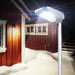 Wagan Tech Solar + LED Floodlight 2000 In A House Backyard