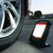 Wagan Tech Wayfinder XL On The Road Beside A Car Tyre