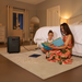 Woman and child reading a book in a bedroom with a Jackery HomePower 3600 Plus Portable Power Station