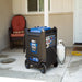 DuroMax XP9000iH Generator On A Patio With A Propane Tank