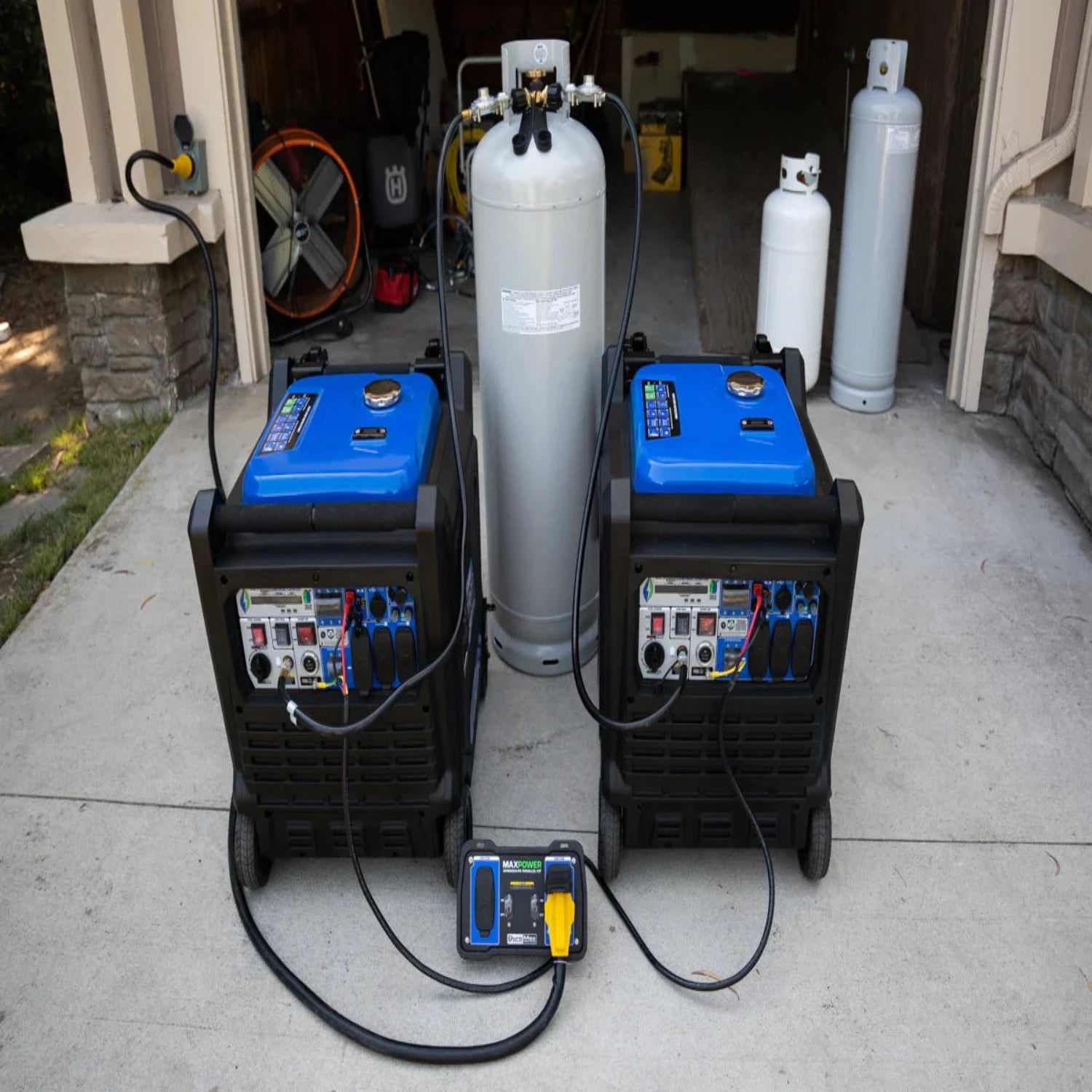 Two DuroMax XP9000iH Generators Connected With The XP4500iH Parallel Kit And A Large Propane Tank