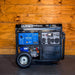 DuroMax XP13750HXT in front of a wood plank wall