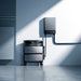 EcoFlow TITAN battery stack on a wheeled base below a wall-mounted Smart Home Panel 10