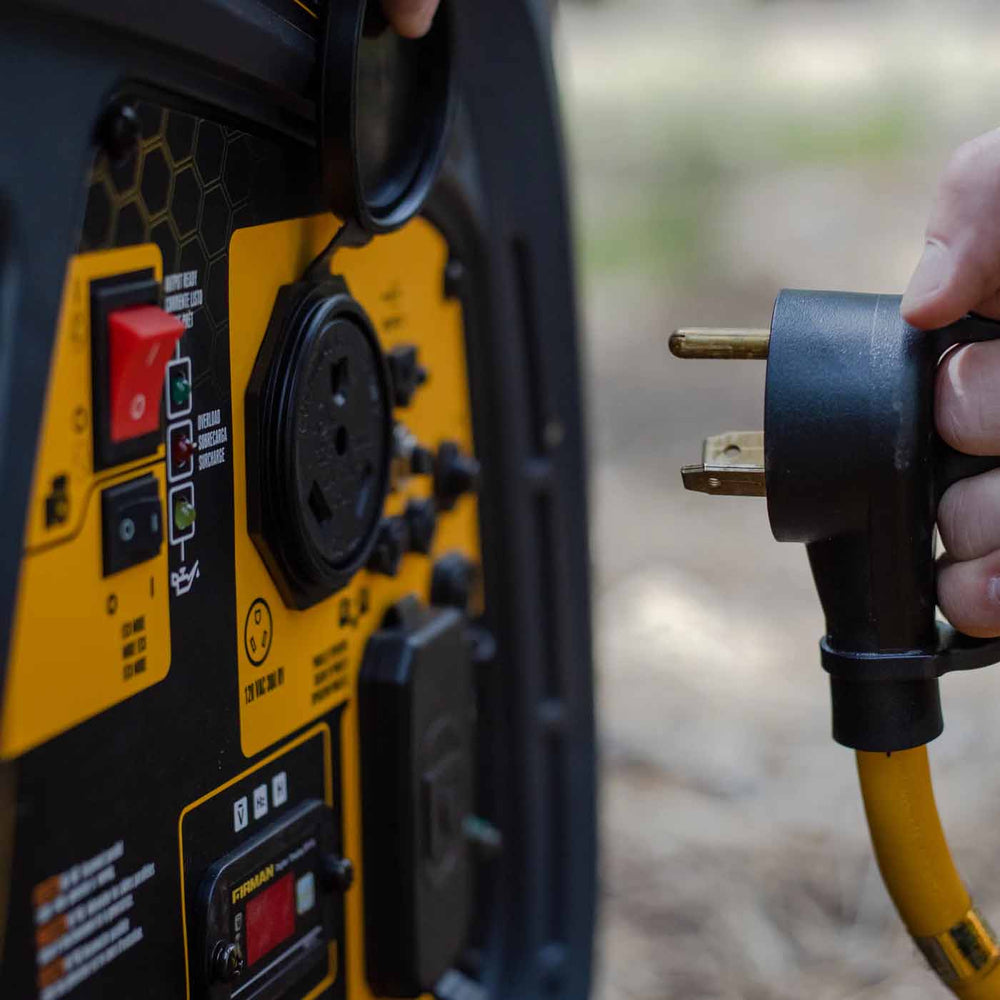 Firman 25' Heavy Duty TT-30P to TT-30R Power Cord Being Plugged Into a Generator