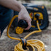 Firman 25' Heavy Duty TT-30P to TT-30R Power Cord Connected to a Generator Outdoors